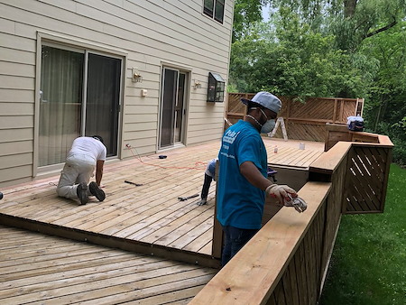 Professional deck refinishing services in addison il restoring weathered wood