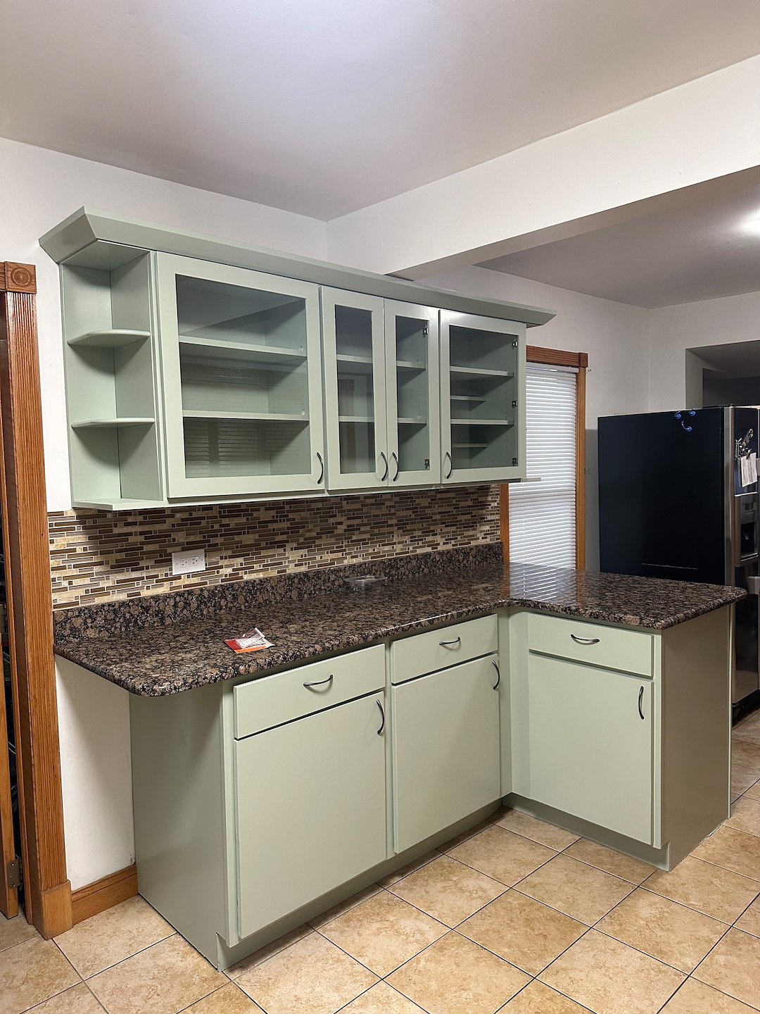 Cherry to Light Green Kitchen Cabinet Painting Transformation in Chicago & North Shore