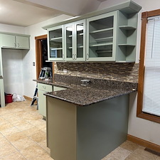 Cherry-to-Light-Green-Kitchen-Cabinet-Painting-Transformation-in-Chicago-North-Shore 1