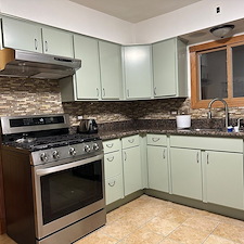 Cherry-to-Light-Green-Kitchen-Cabinet-Painting-Transformation-in-Chicago-North-Shore 0